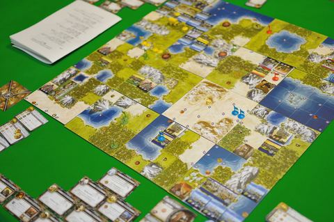 A overhead view of a game of Sid Meier's Civilization: The Board Game" in progress.