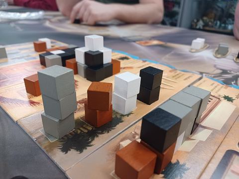 Stacked stones at various sites in the board game Imhotep .