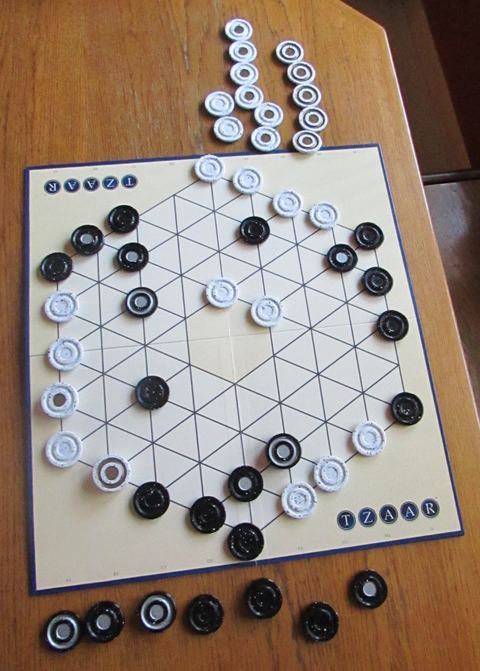 This is a photograph of a TZAAR game in progress.
