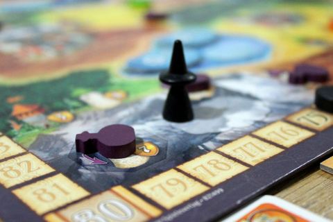 The purple potion in the board game Broom Service .