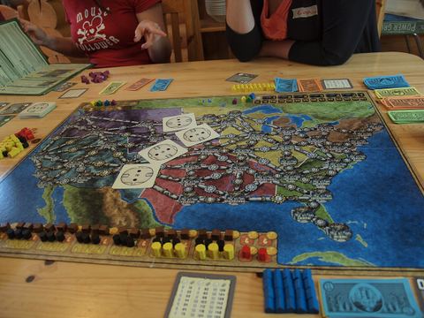 A game of Power Grid (or as hard-core Finnish board gamers like to call it, "sähkö" (meaning "electricity")), played at a special board game weekend camp in Finland.