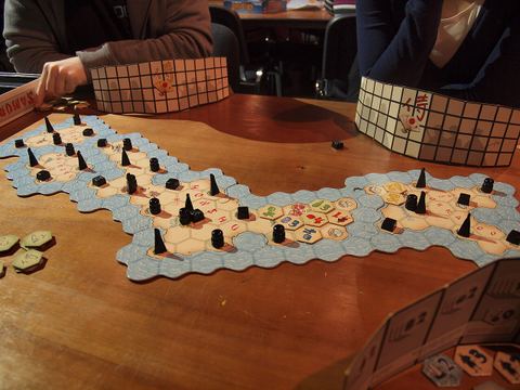 A game of Samurai, a strategic board game based upon territorial expansion, themed after the ancient Japanese samurai culture, being played at the annual Finnish tabletop board game day in central Helsinki, Finland.
