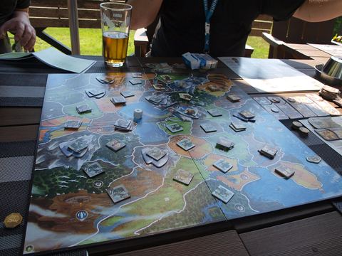 A game of Small World being played in Fiskars, Finland, in the middle of June.